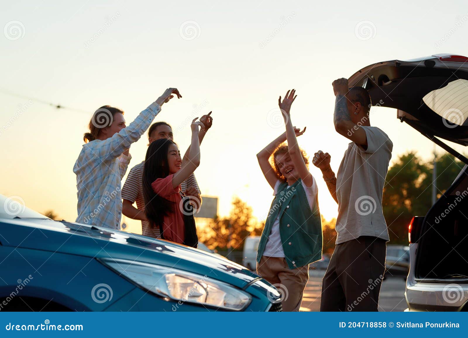 dancing outside the car