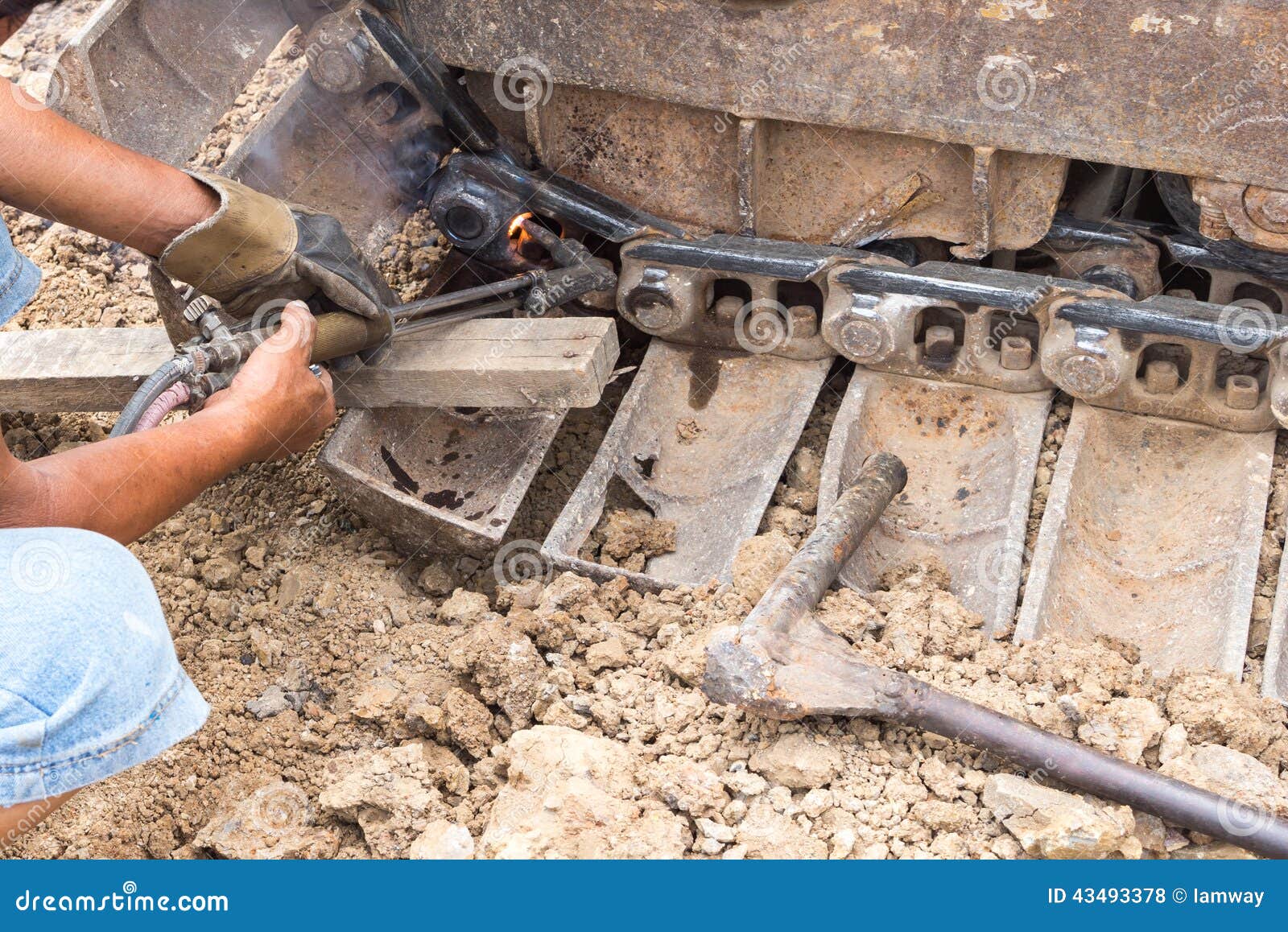 Fixing Bulldozer Wheel with Gas Cutting Torch Stock Photo - Image of