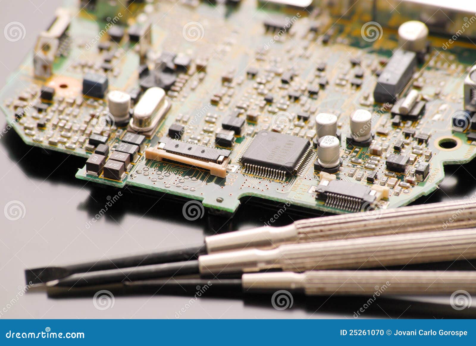 Fixing a Circuit Board stock photo. Image of engineer 25261070