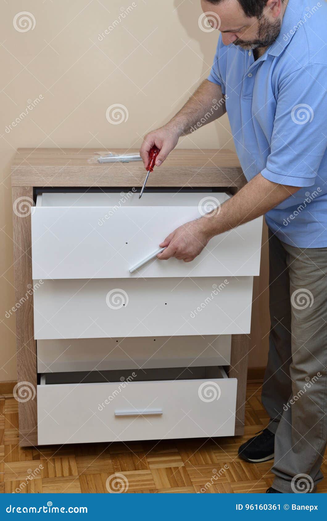 Fixing A Drawer Handle Stock Image Image Of Compartment 96160361