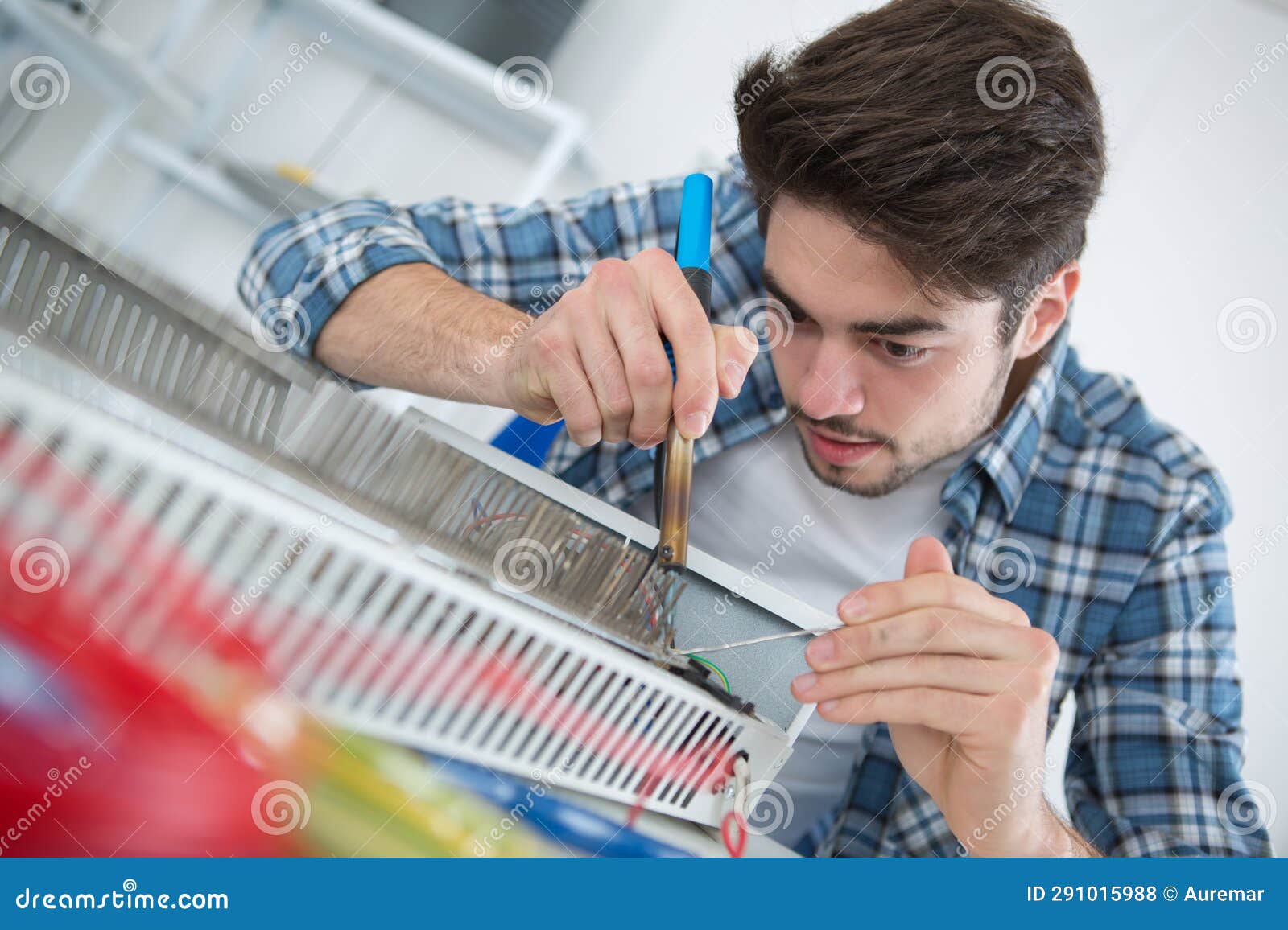 He Fixing and Soldering Radiator Stock Photo Image of solder, fire