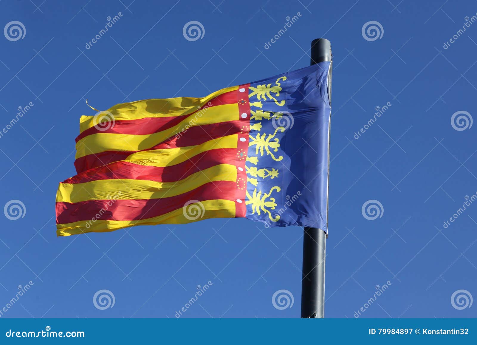 flag of comunidad valenciana, region in spain, moving in the win