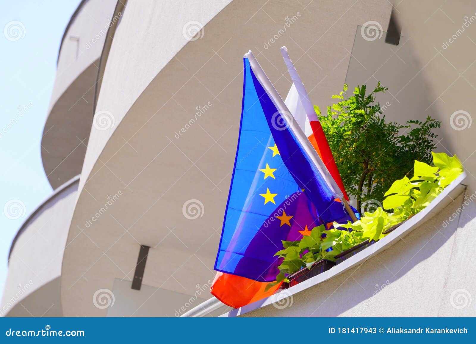 The Flag of European Union is Blue with Stars and Flag of Poland is Red ...