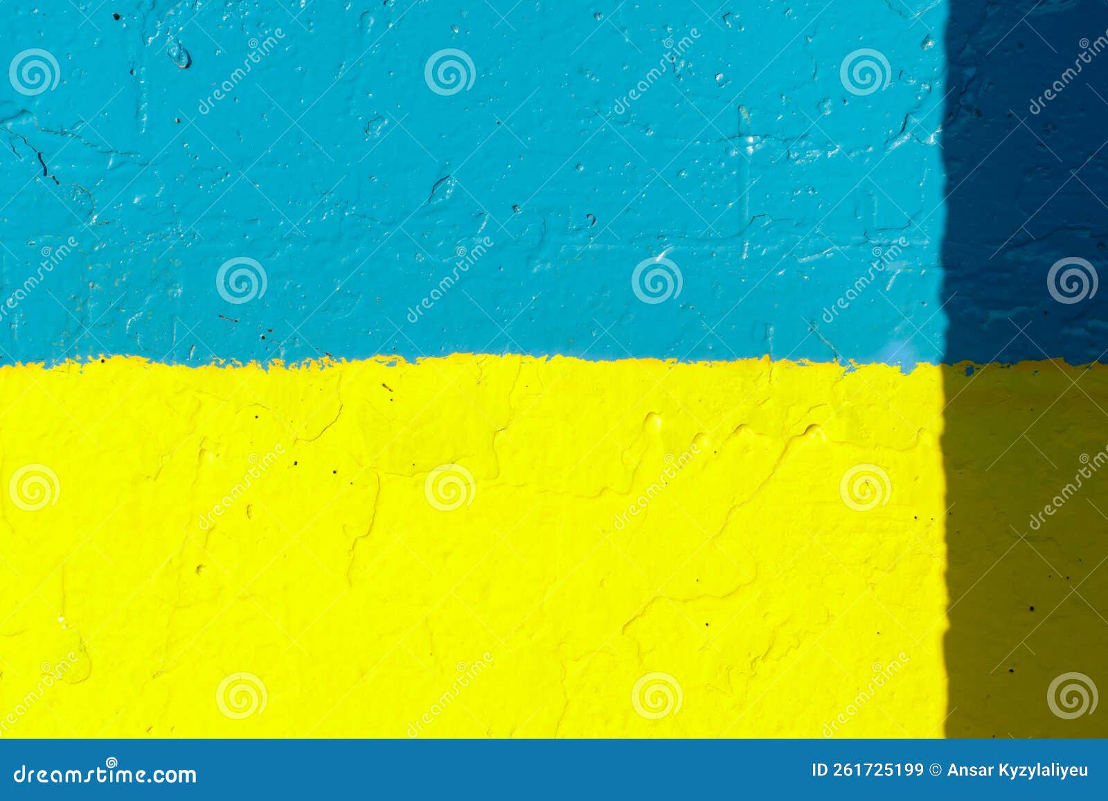 The Flag of Ukraine on the Fence. the Surface of the Concrete Fence is