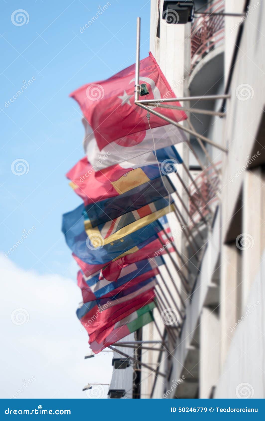 Flags on a building editorial stock image. Image of symbol 50246779