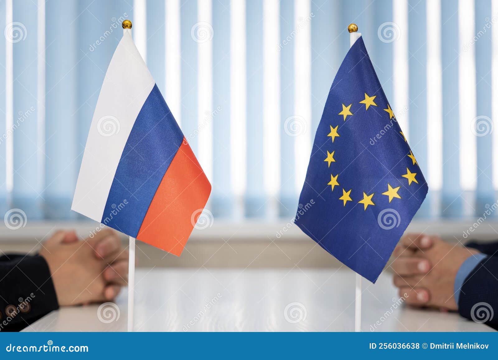 flags of russia and european union. international negotiations. conclusion of contracts between countries. concept of