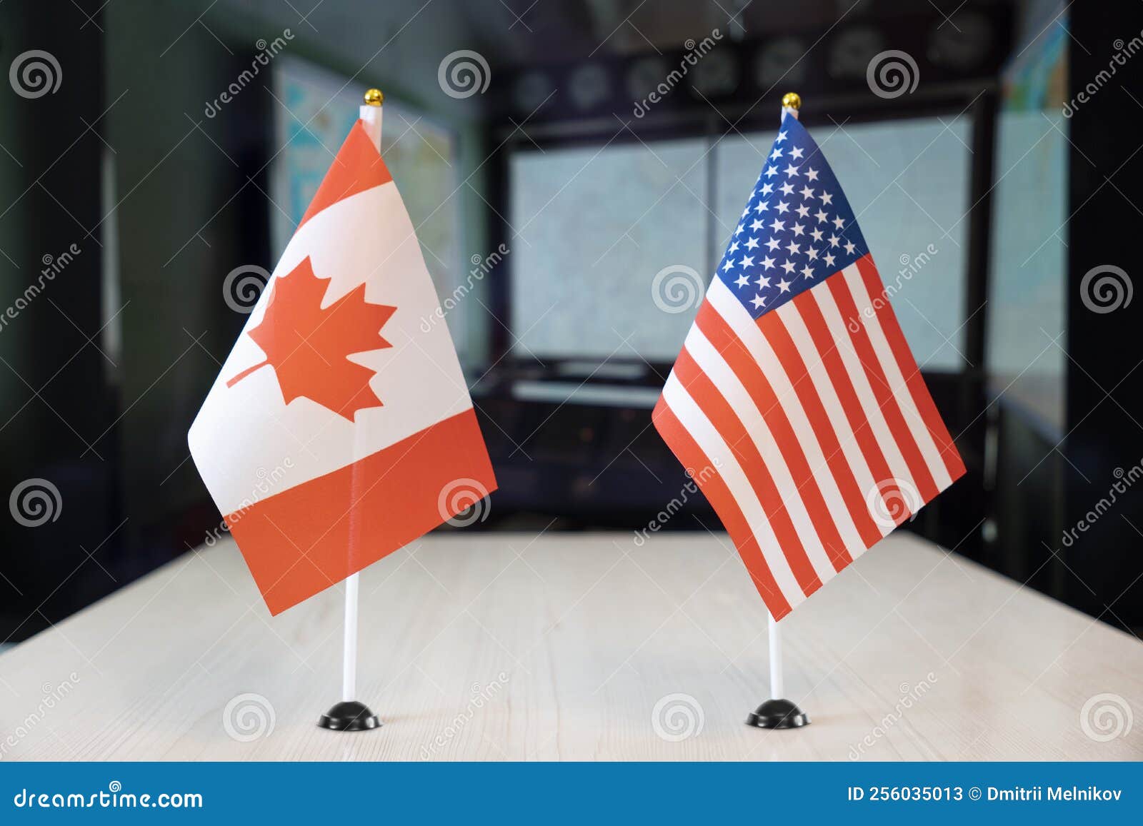 flags of united states and canada. international negotiations. conclusion of contracts between countries. concept of communication