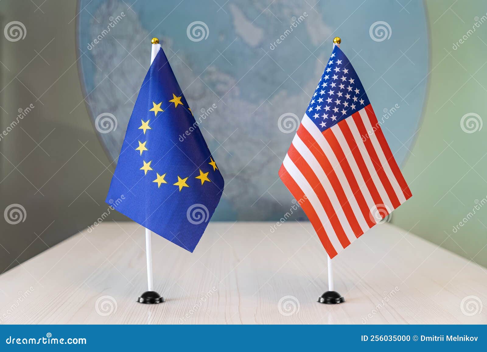 flags of united states and european union. international negotiations. conclusion of contracts between countries. concept of