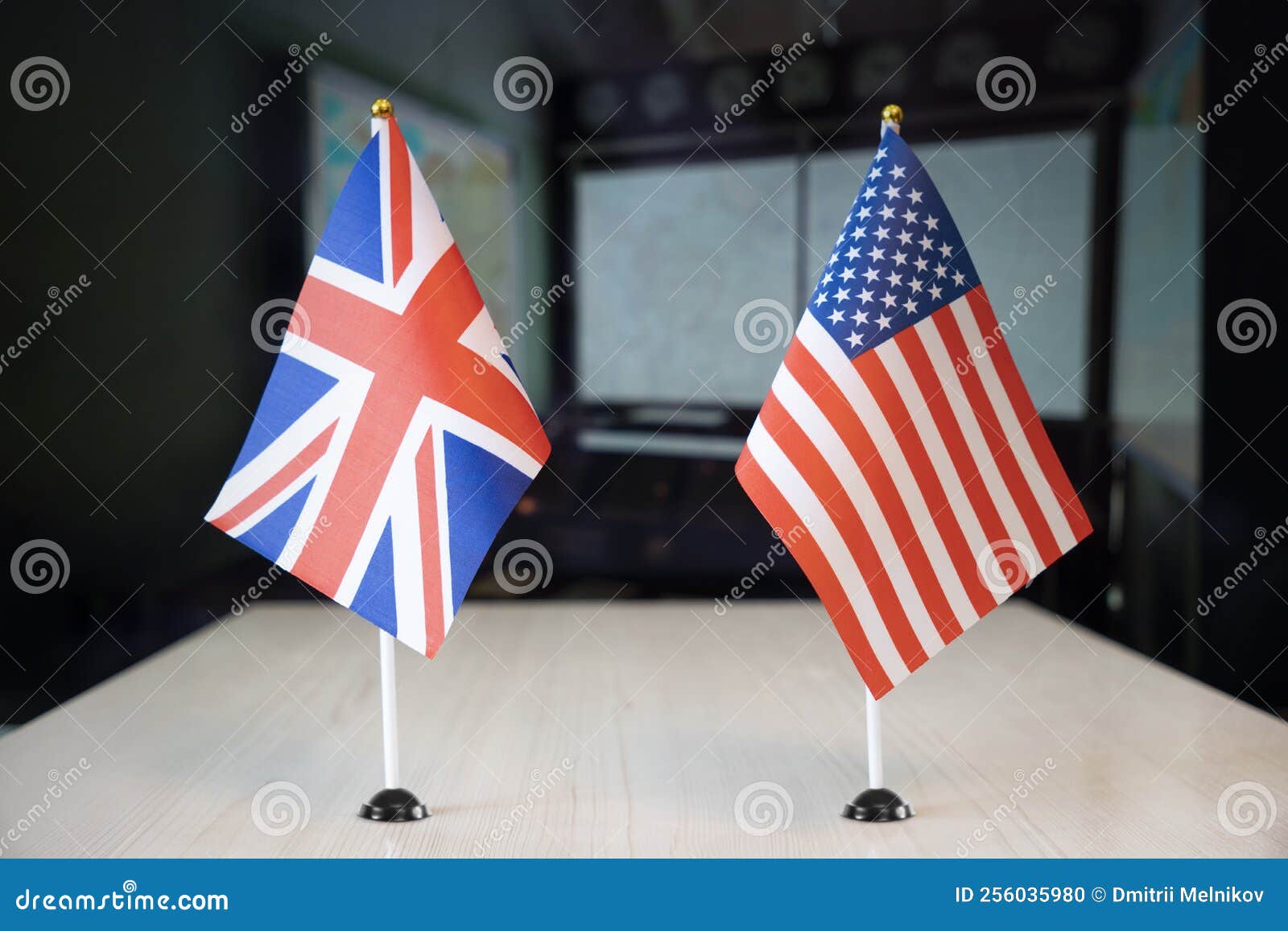 flags of united states and united kingdom. international negotiations. conclusion of contracts between countries. concept of