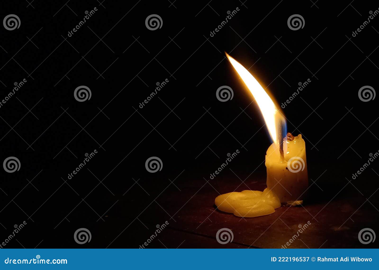 The Flame of a Candle Burning in the Dark Stock Image Image of font