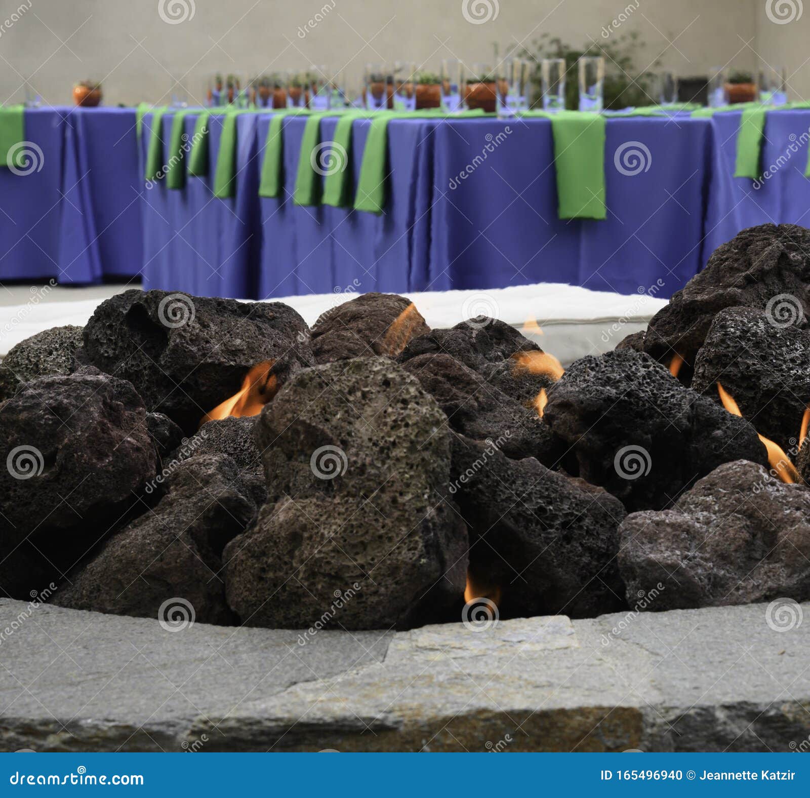 Flames from a Fire Pit in Front of a Blue and Green Table Setting with  Basketball Centerpieces Stock Photo - Image of arrangement, decorated:  165496940, image size:1600x1576