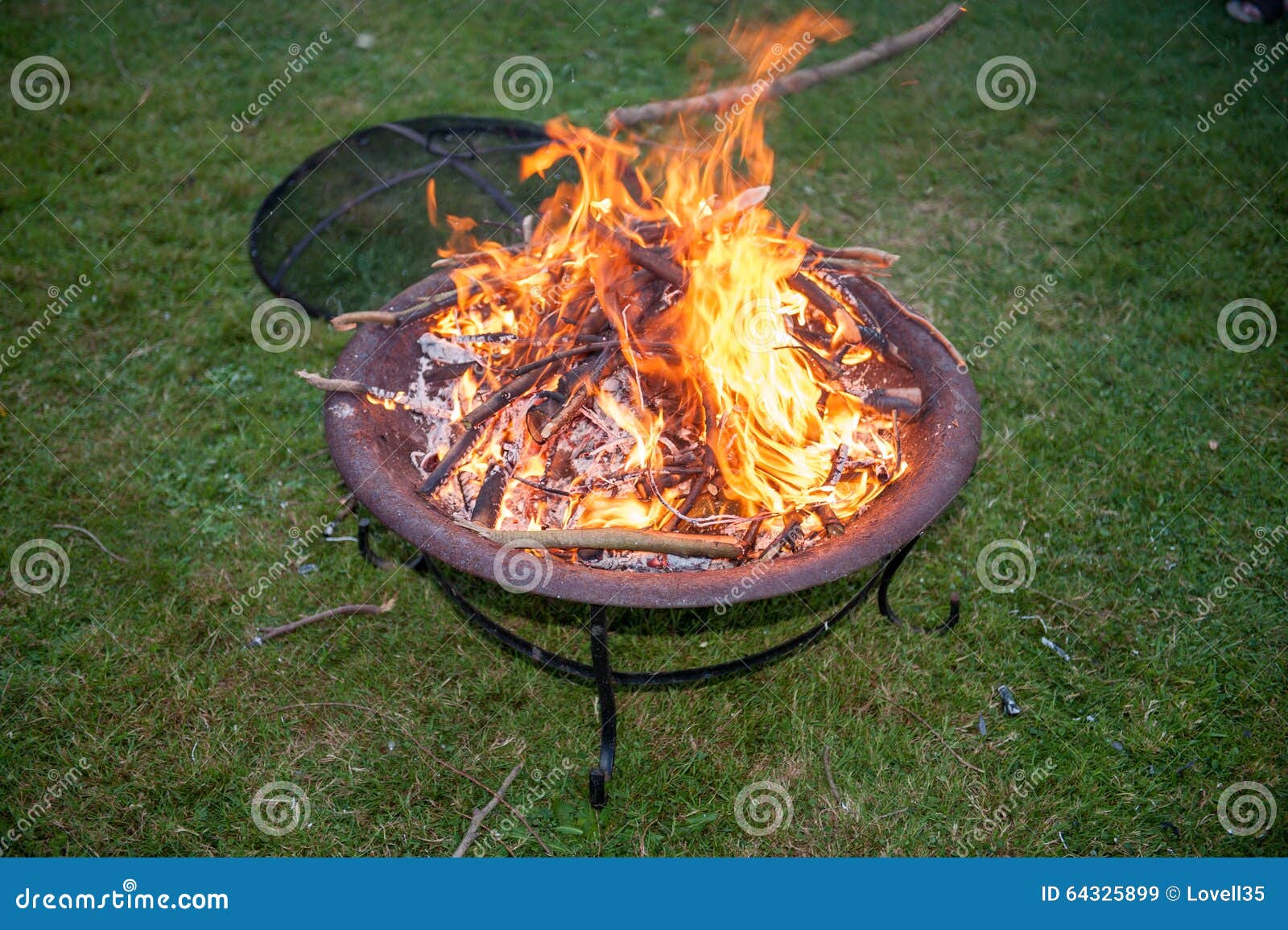 Flames on a Garden Fire Pit Stock Image - Image of flames, burst: 64325899