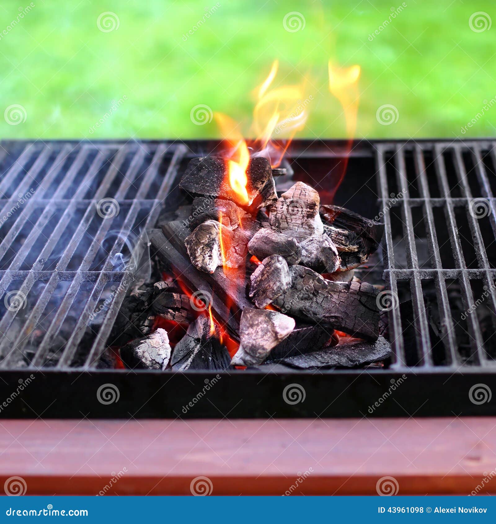 flaming charcoal and bbbq grill