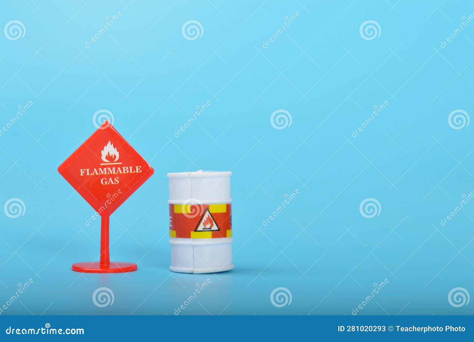 Flammable Liquid Gas Warning Sign Isolated on a Blue Background Stock