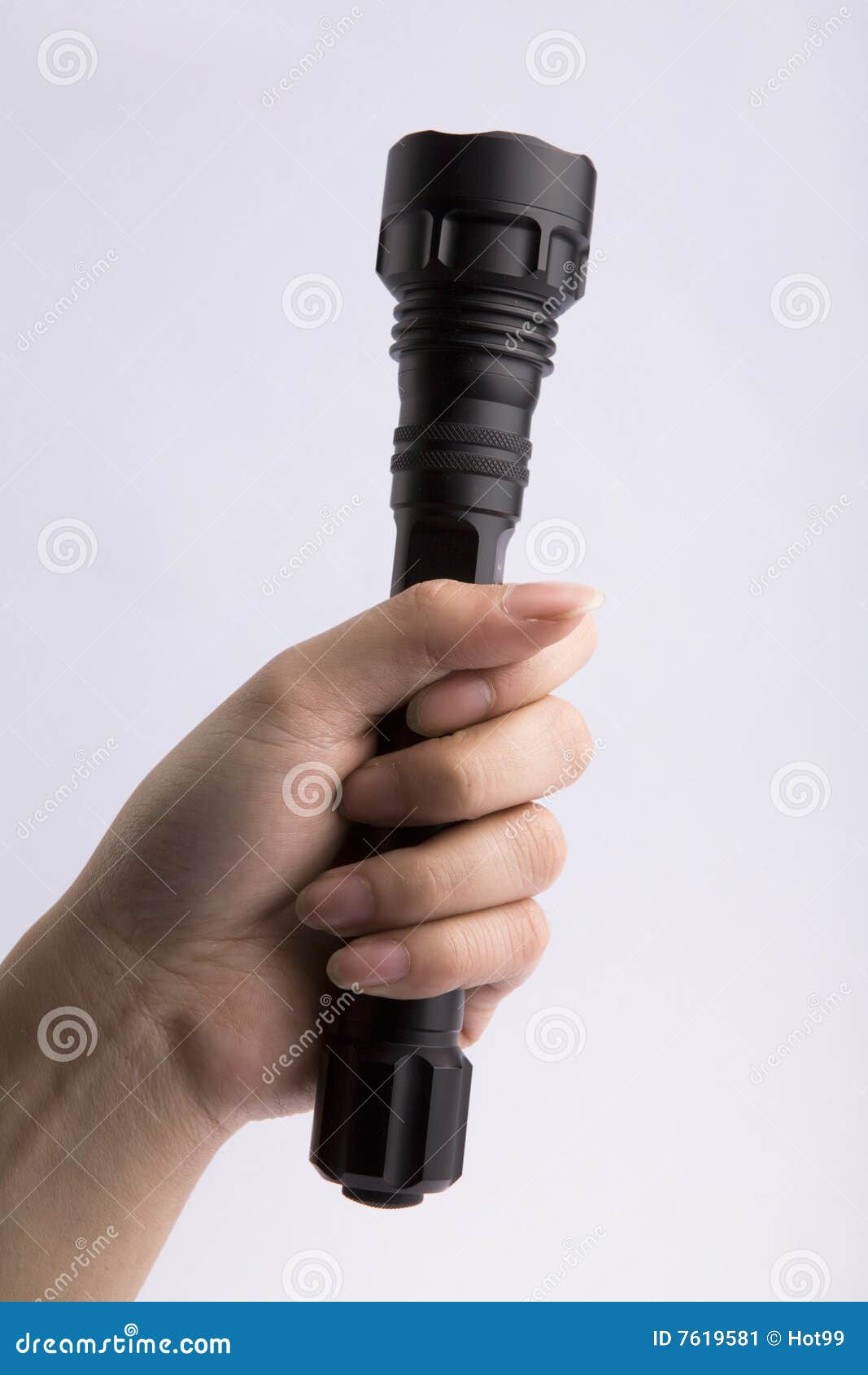 Flashlight in hand, stock image. Image of beam, battery 7619581