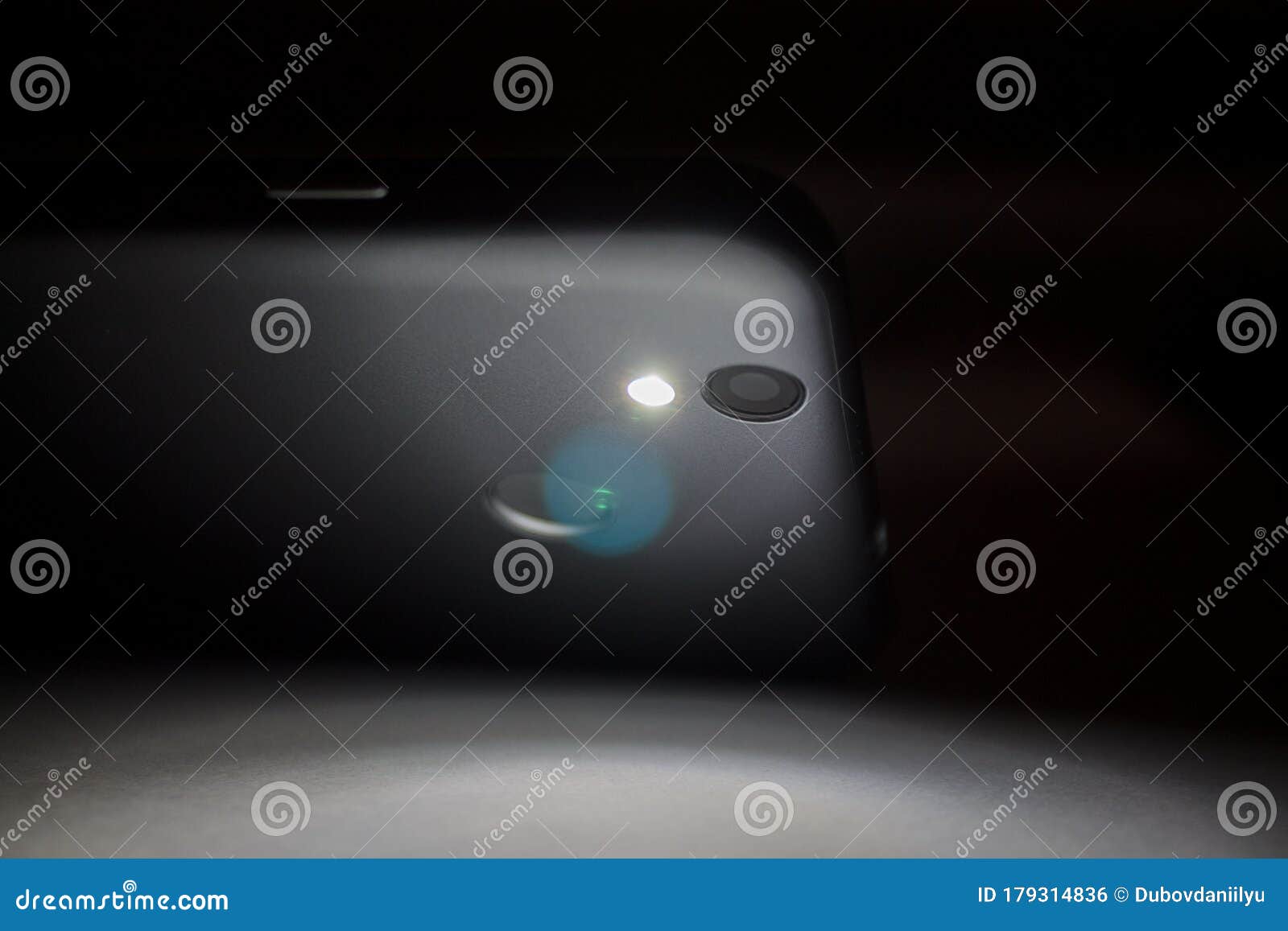 Flashlight Shining in the Dark, Flashlight in the Smartphone on a Dark