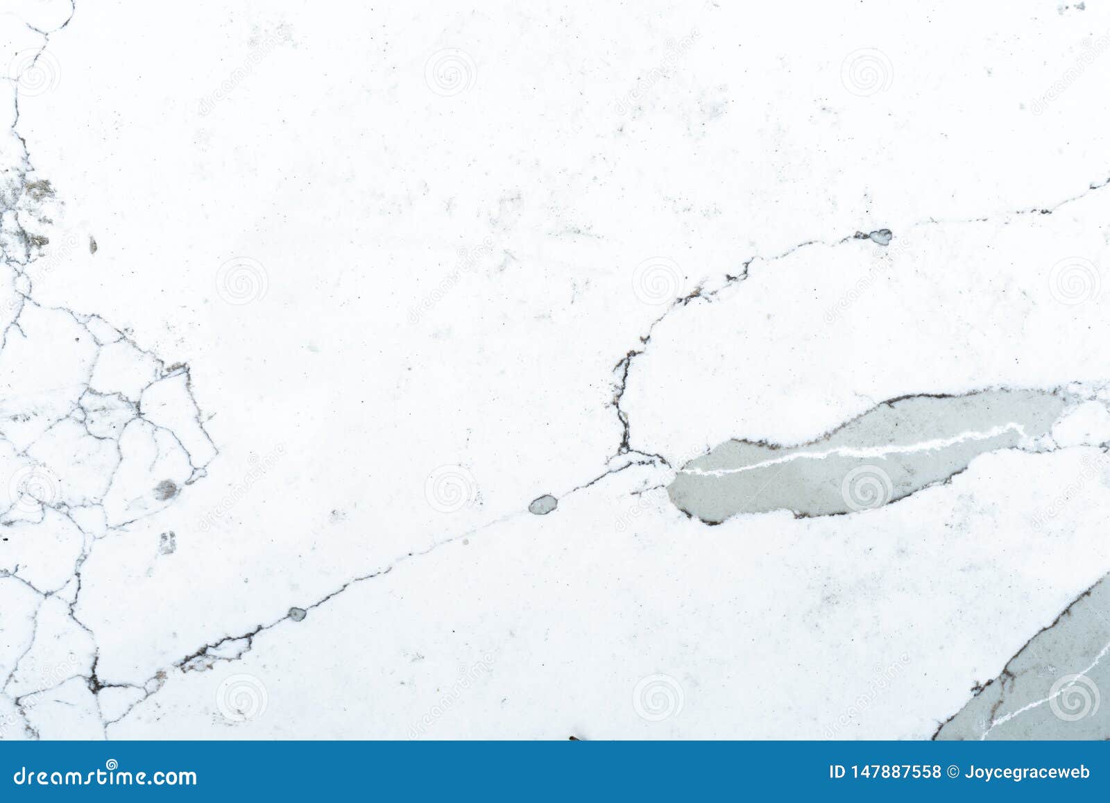flat background slate of polished marble used for construction, or a backdrop . marble pattern is mostly white, black and