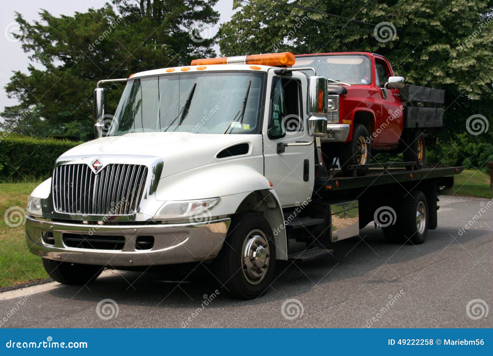 Flat Bed Tow Trck with Truck Stock Photo Image of push, away 49222258