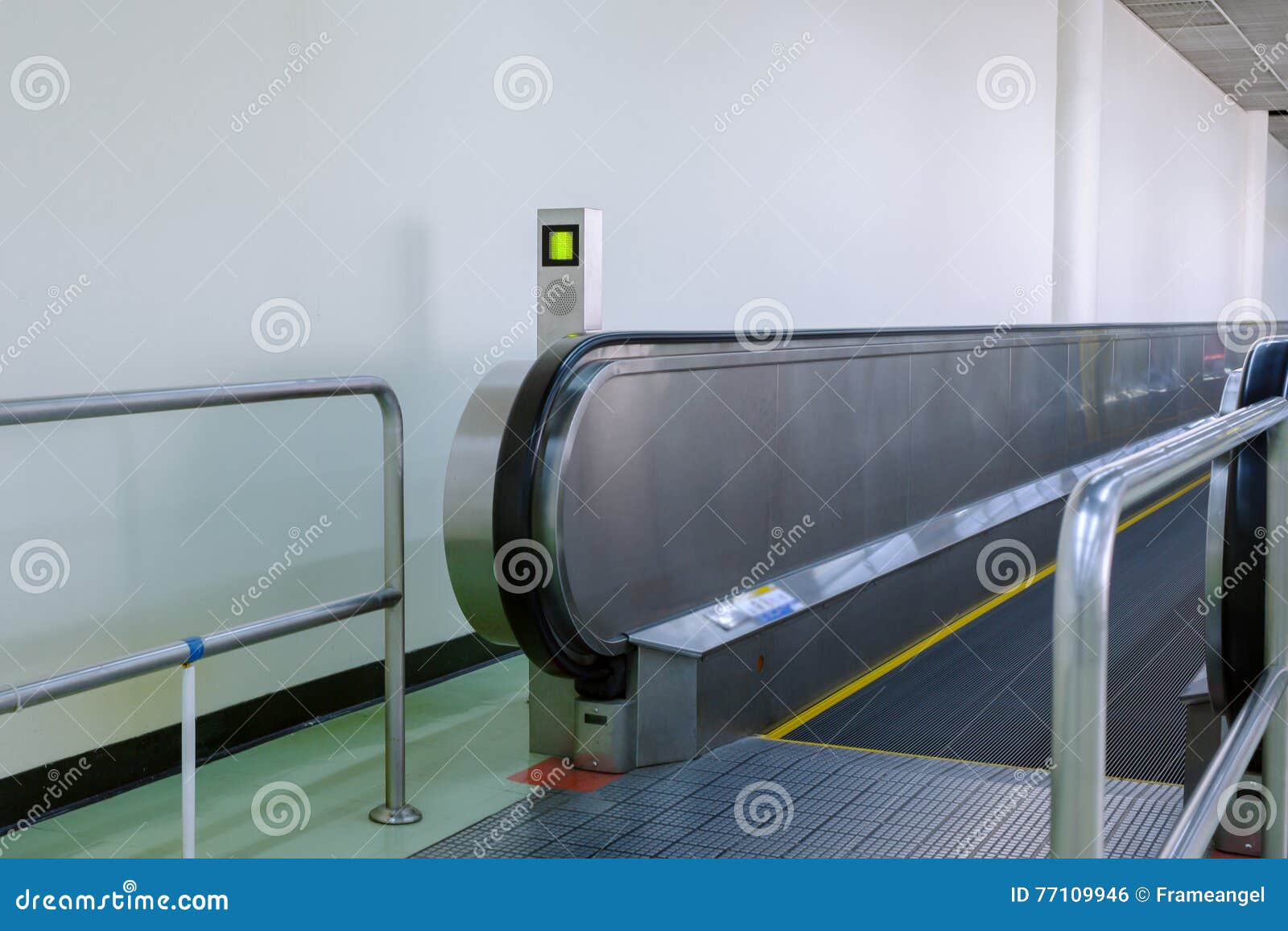 Flat Escalator for Passengers Transportation in Airport Stock Photo