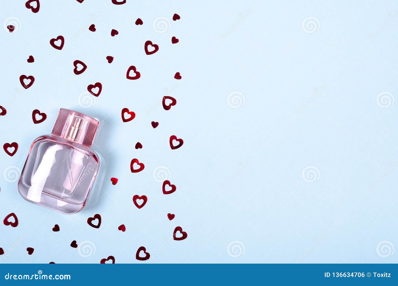 Flat Lay Arrangement Of Hearts And Perfume Bottle For Mock Up