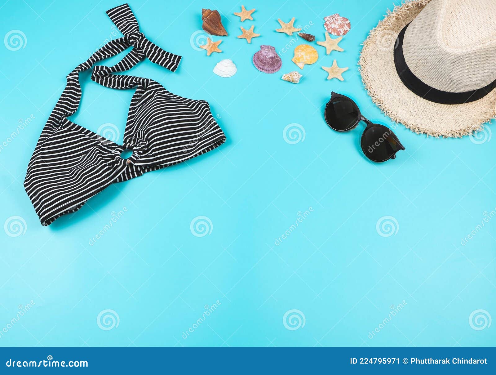 Flat Lay of Bikini, Straw Hat, Sunglasses, Sea Shells and Starfish on ...
