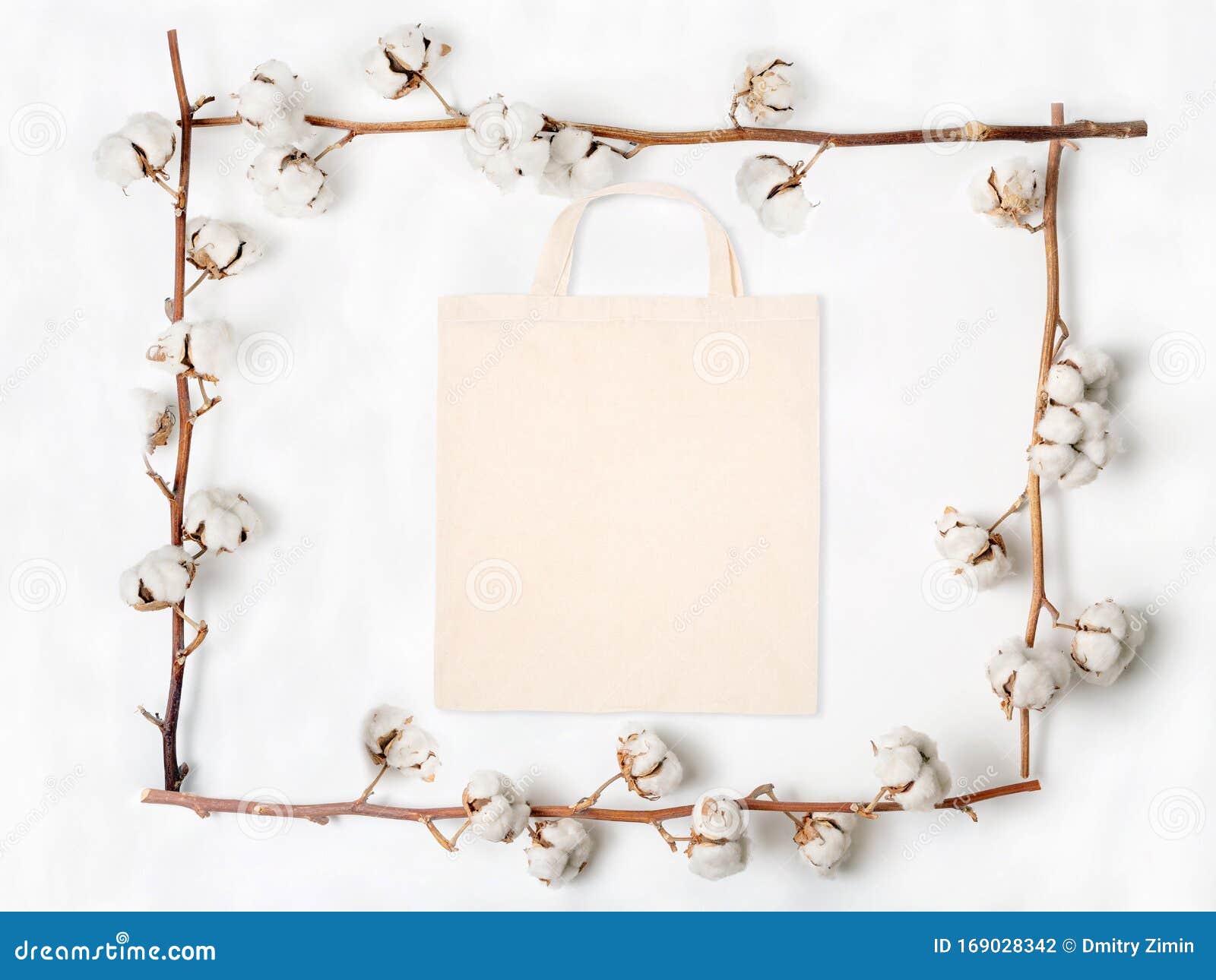 Download Flat Lay Of Blank Fabric Bag With Cotton Flower Branches On White Background Stock Photo - Image ...