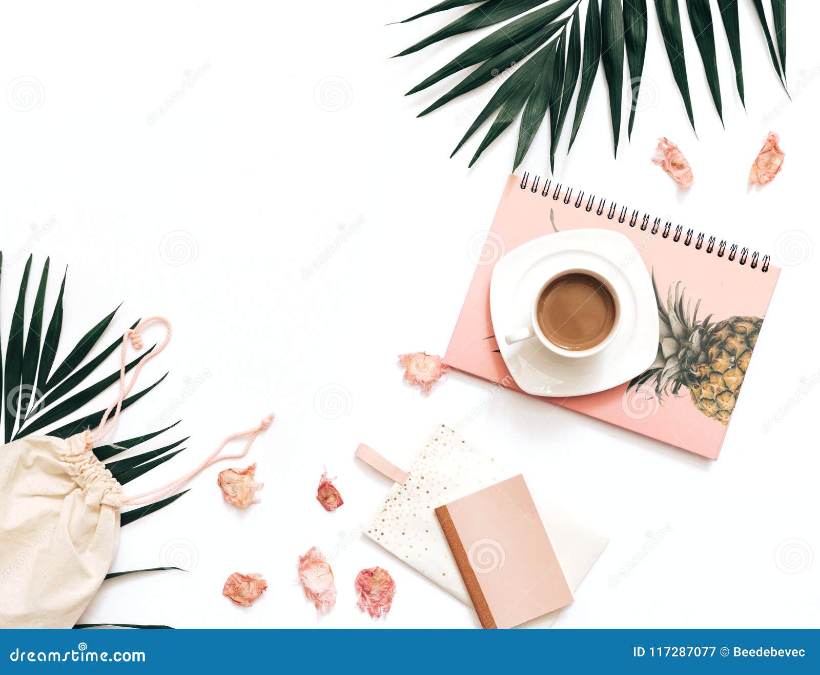 flat lay blogger workspace mockup with tropical leaves