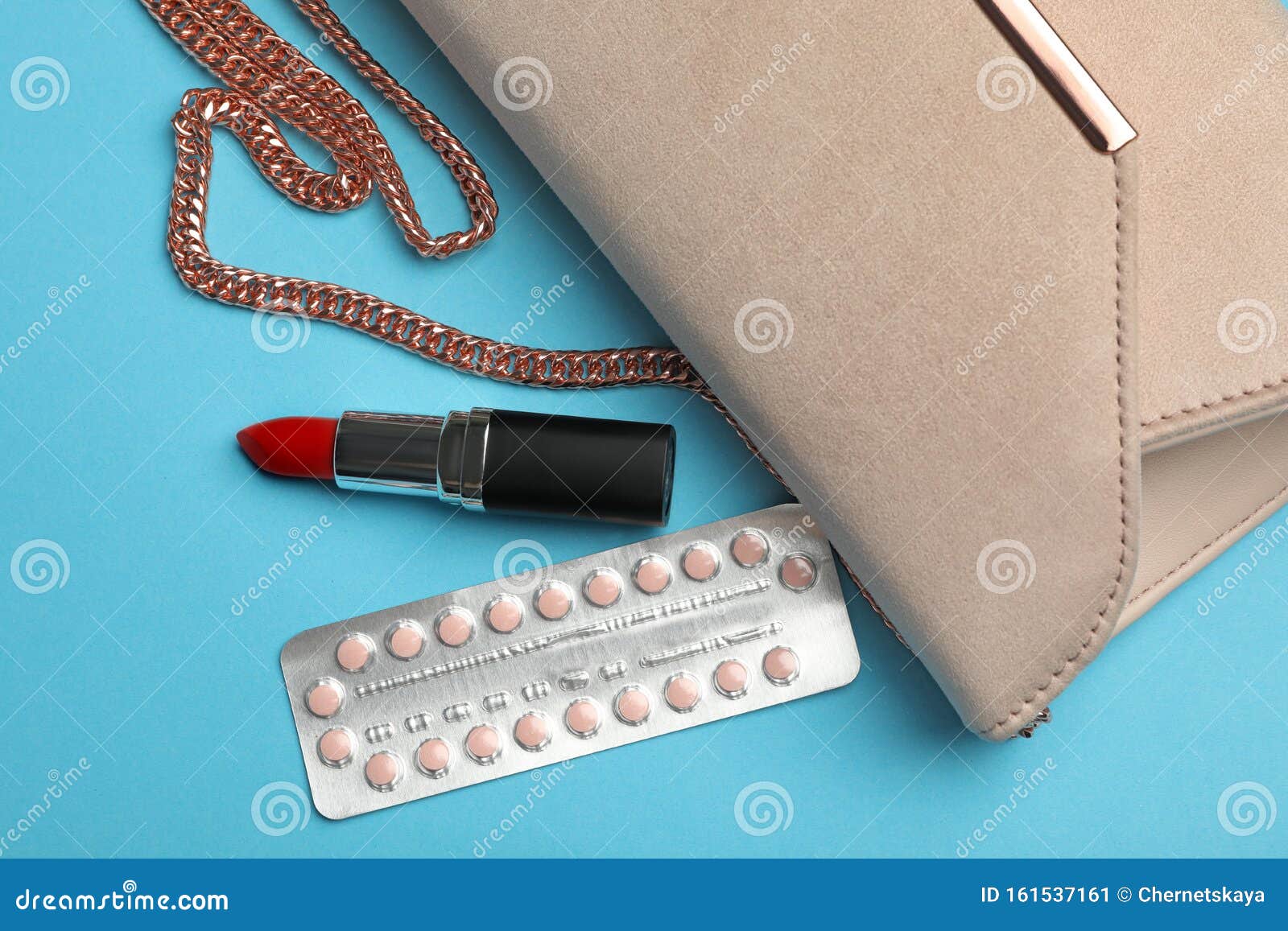 Flat Lay Composition With Birth Control Pills On Blue Background Safe