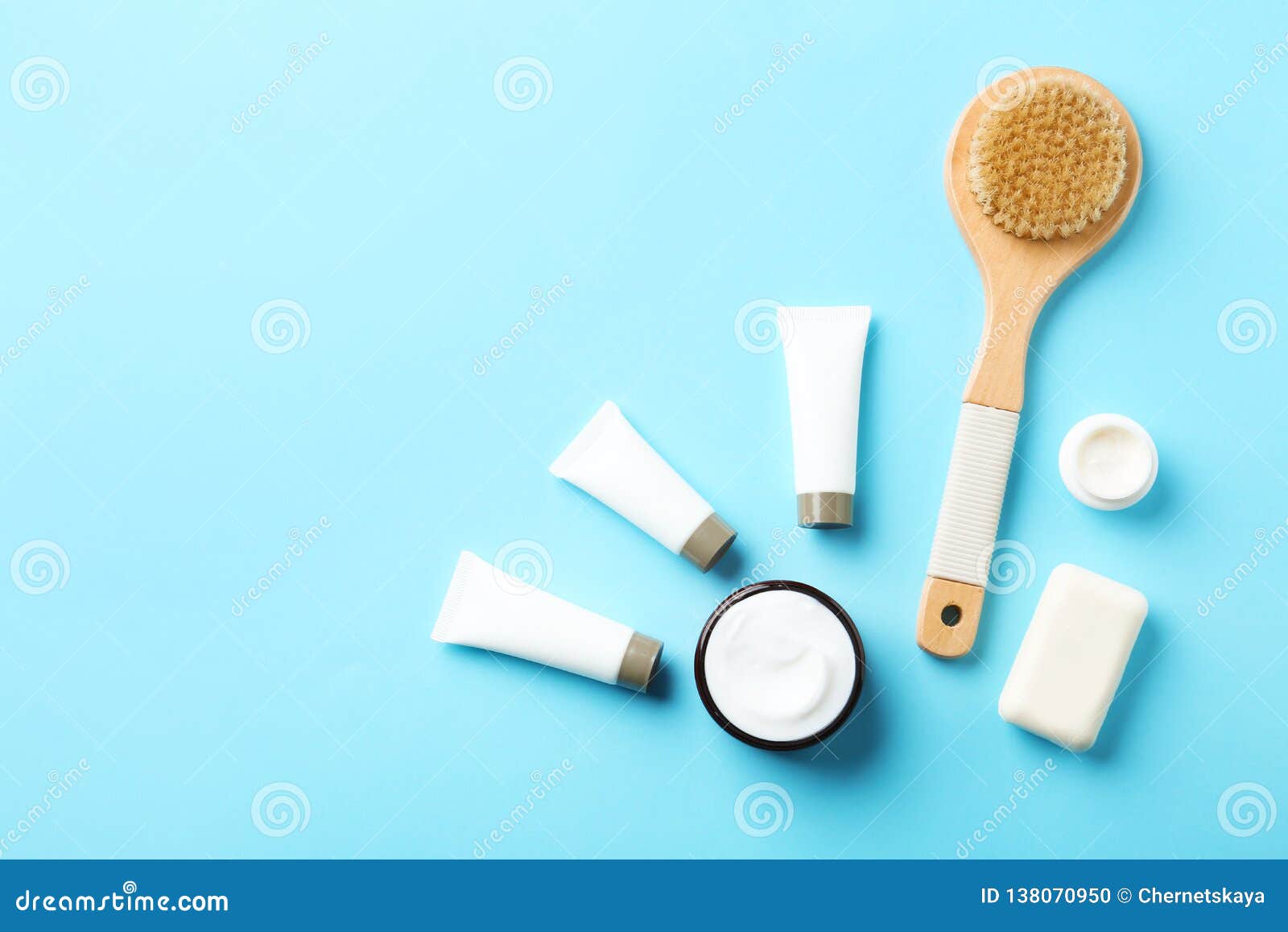 Flat lay composition with body care products and space for text on color background