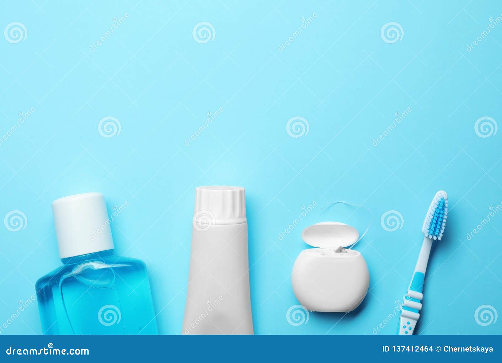 Flat Lay Composition with Toothpaste, Oral Hygiene Products and Space