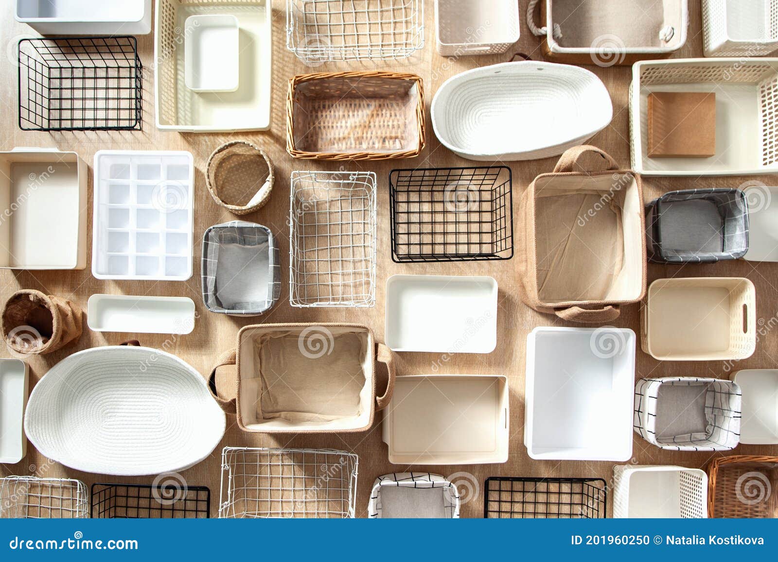flat lay of marie kondo`s storage boxes, containers and baskets with different sizes and s