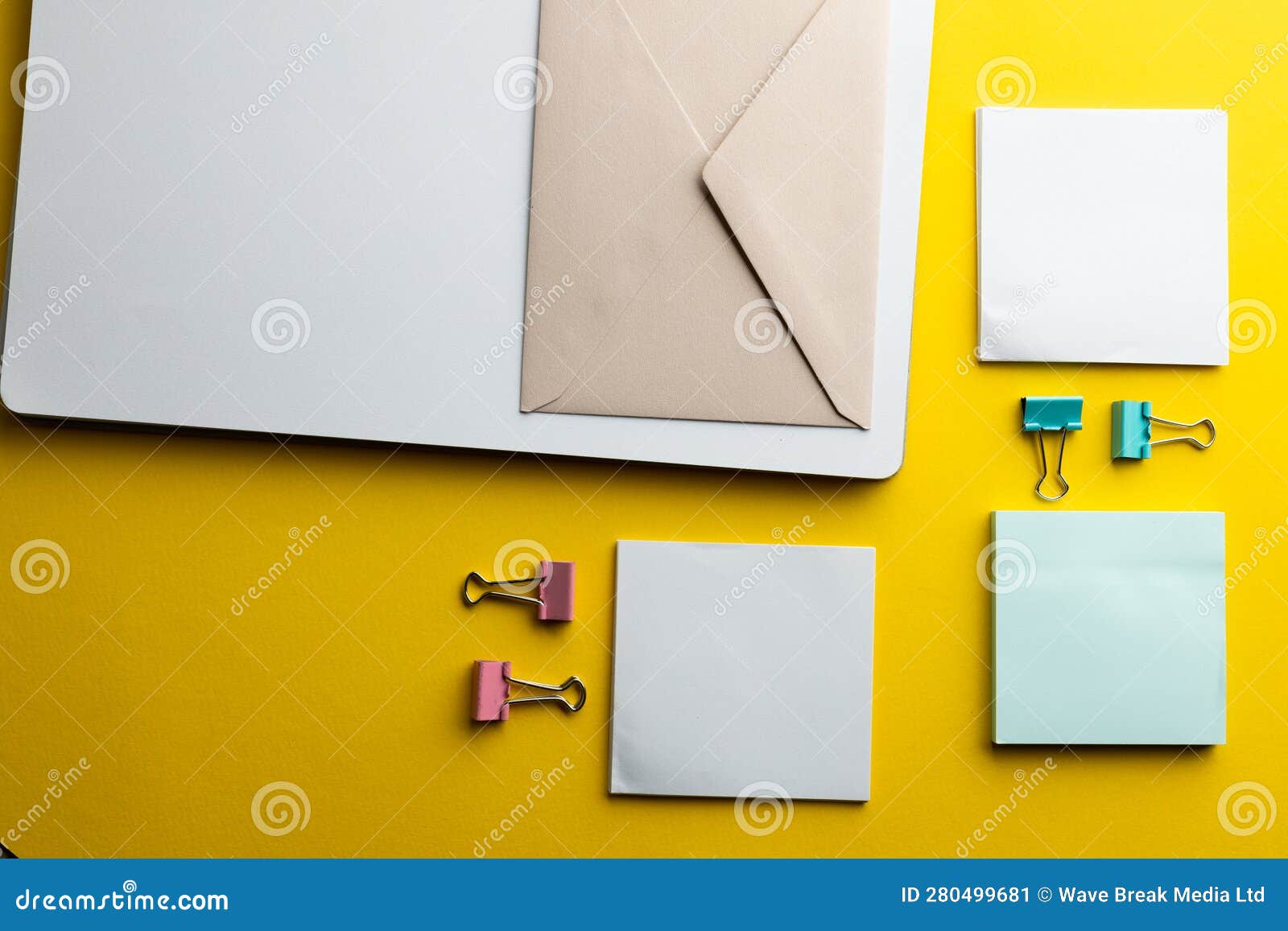Flat Lay of Memo Notes, Paper Clips, Envelope and White Paper with Copy