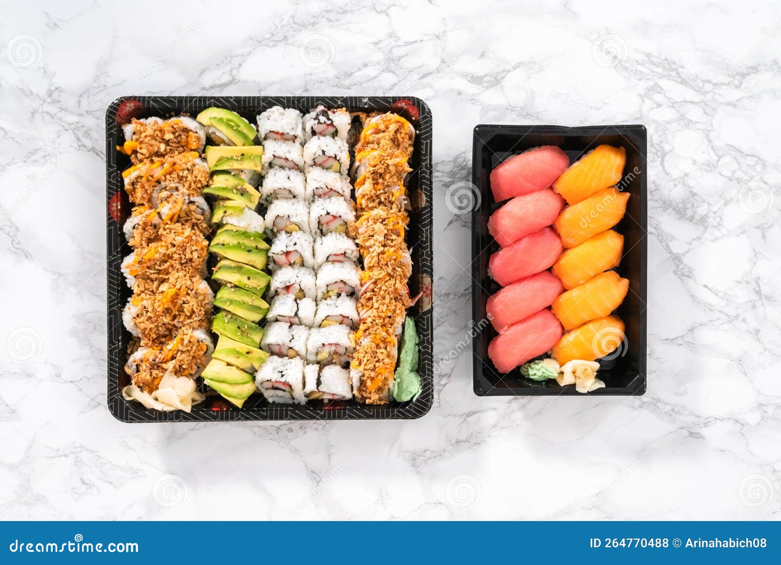 Pre-packaged sushi. Flat lay. Pre-packaged variety of sushi and sushi rolls in a plastic tray.