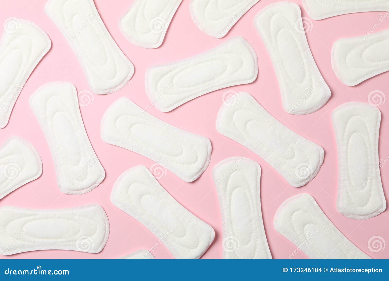 flat lay with sanitary pads on pink background