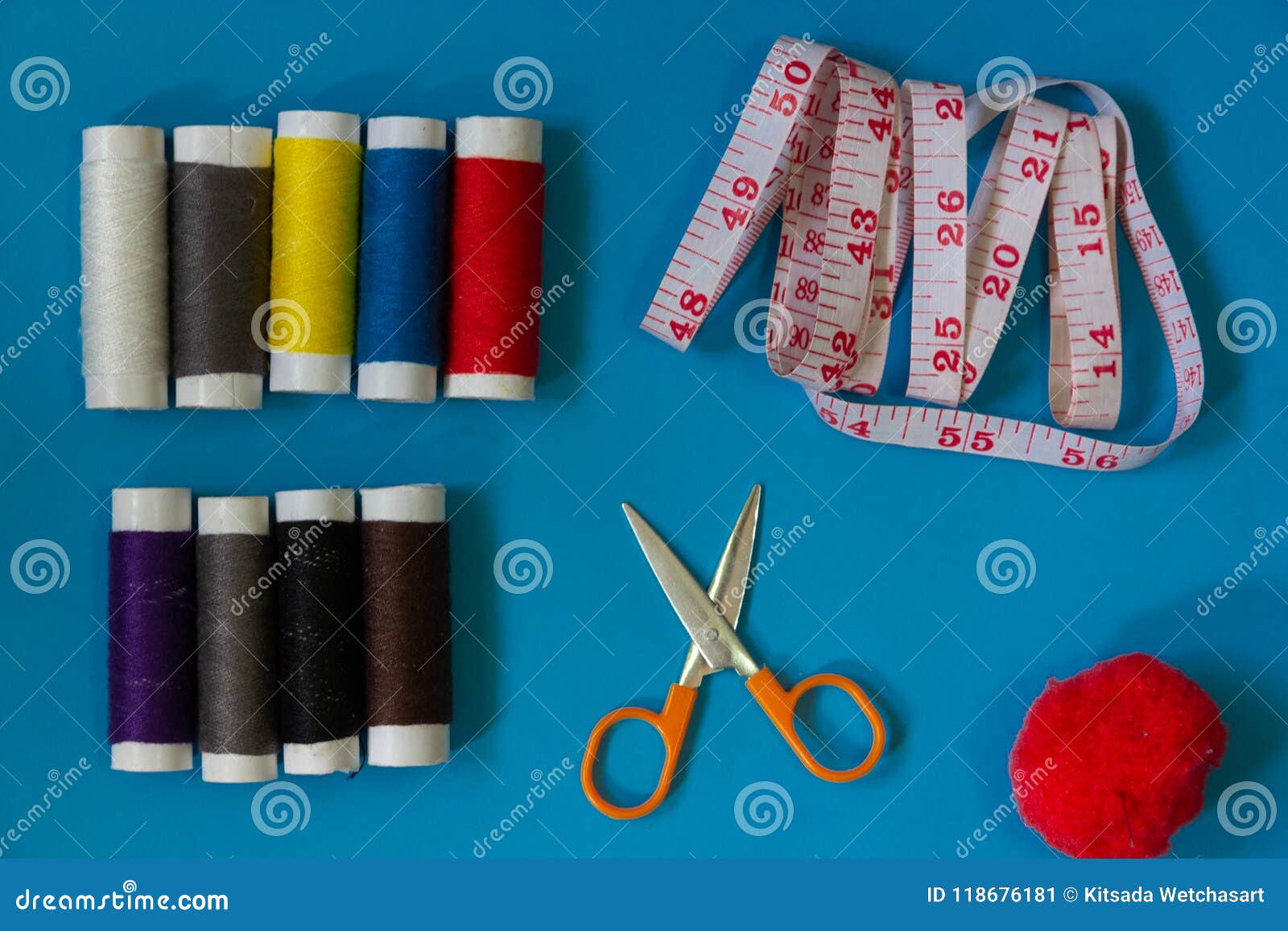 Flat Lay Sewing Kit, Scissors, Multicolored Spool of Thread, Tape