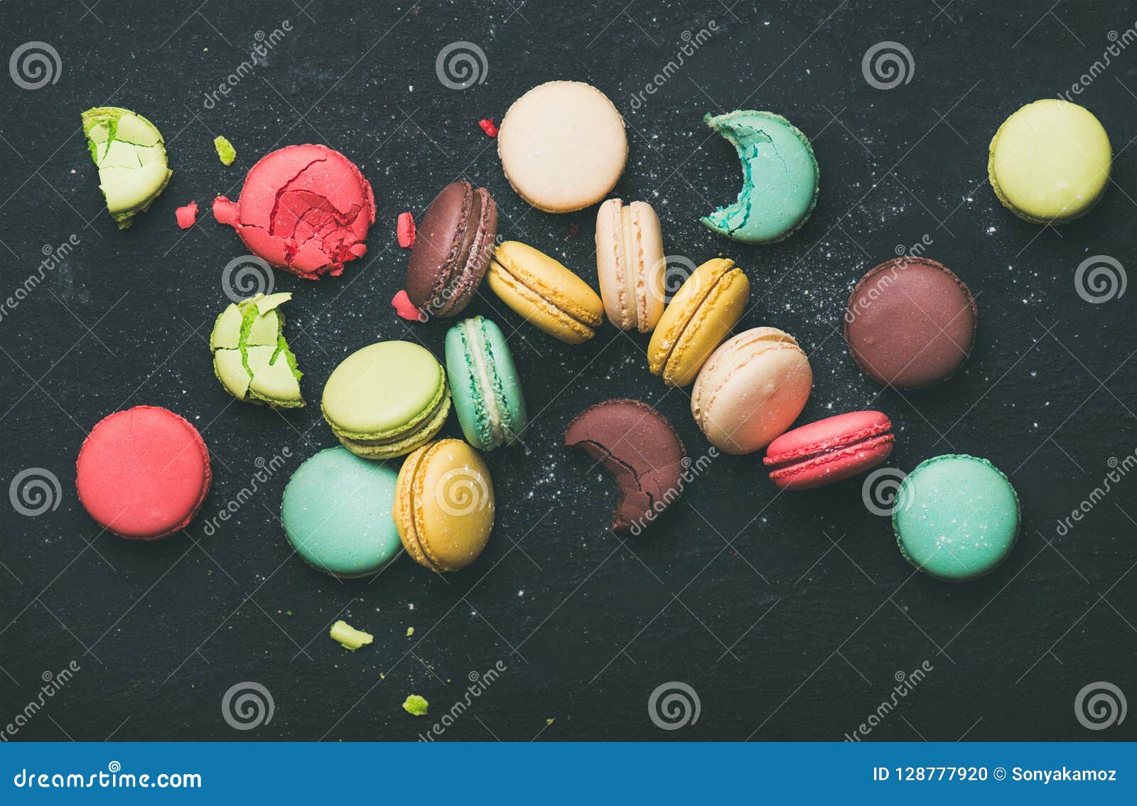 flat-lay of sweet colorful french macaroon cookies variety