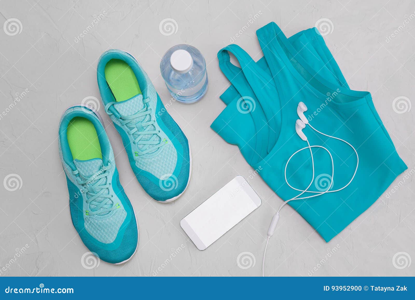 Flat Light Blue Athletic Shoes, a Bottle of Water, a T-shirt and ...