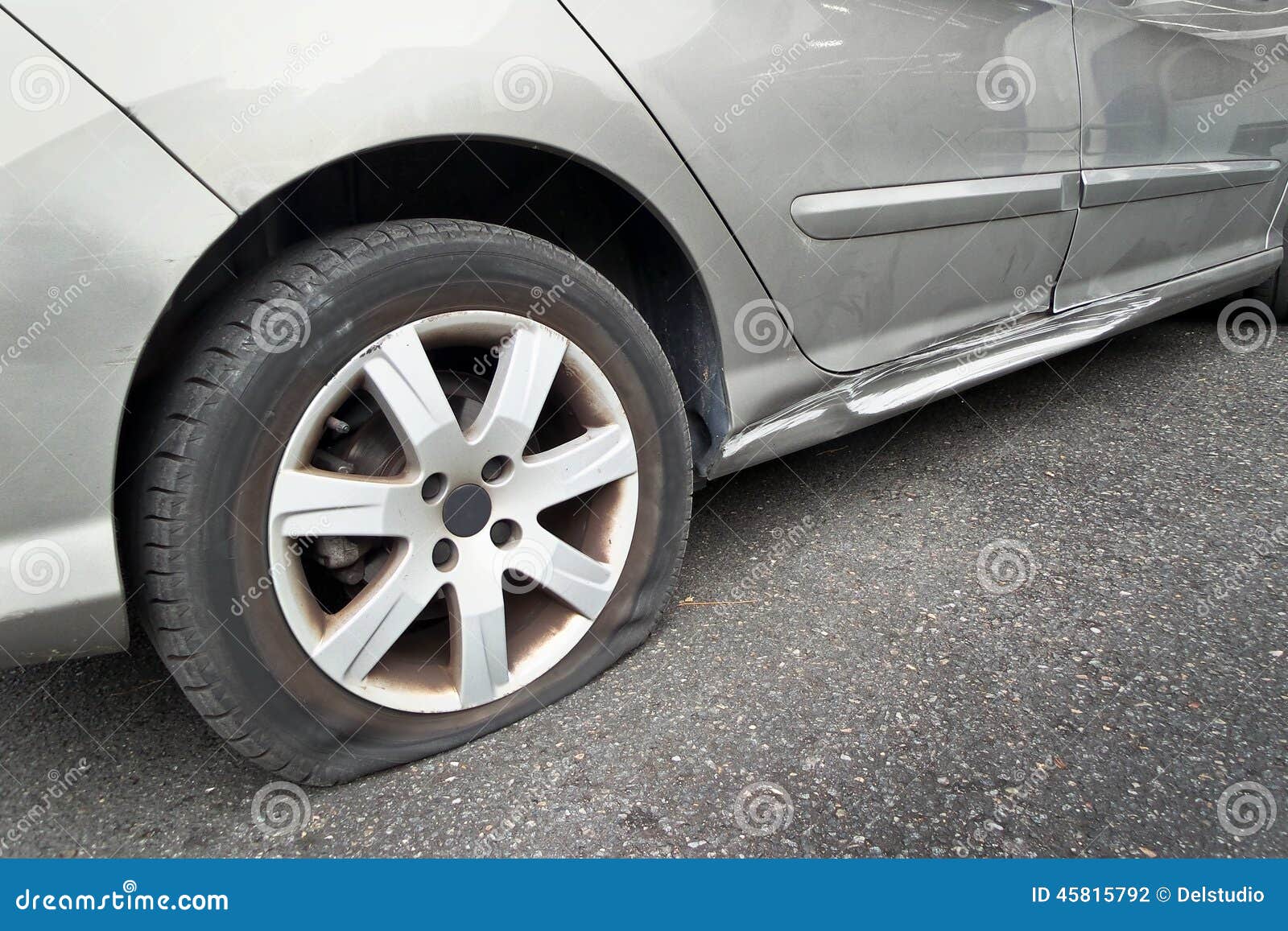 Flat rear tire on car stock photo. Image of rear, close 45815792