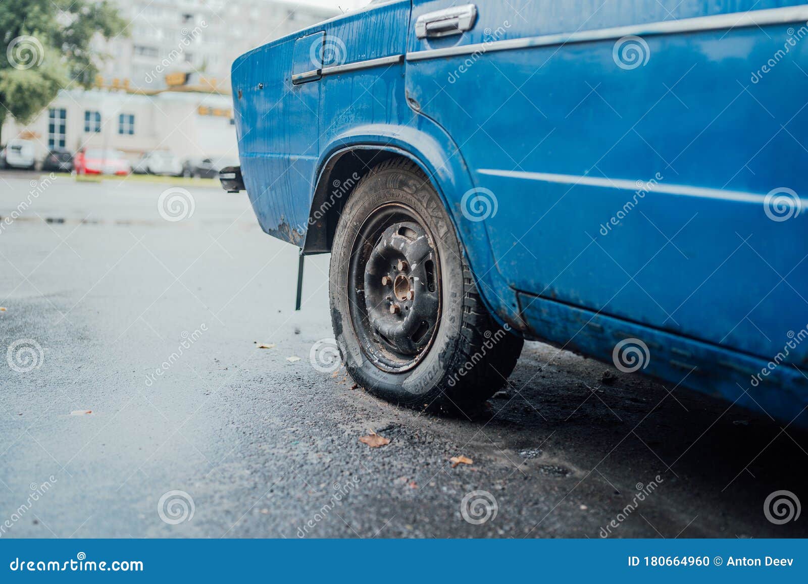 Flat Tire on a Blue Car. Clunkers Stock Photo Image of transport