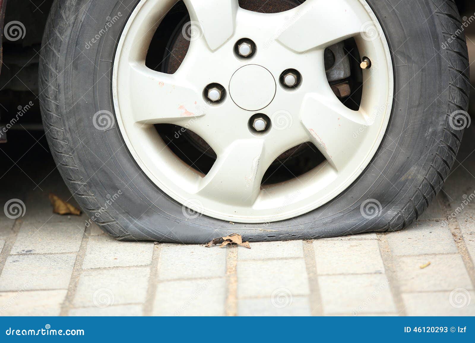 Flat tire on car wheel stock image. Image of transportation 46120293