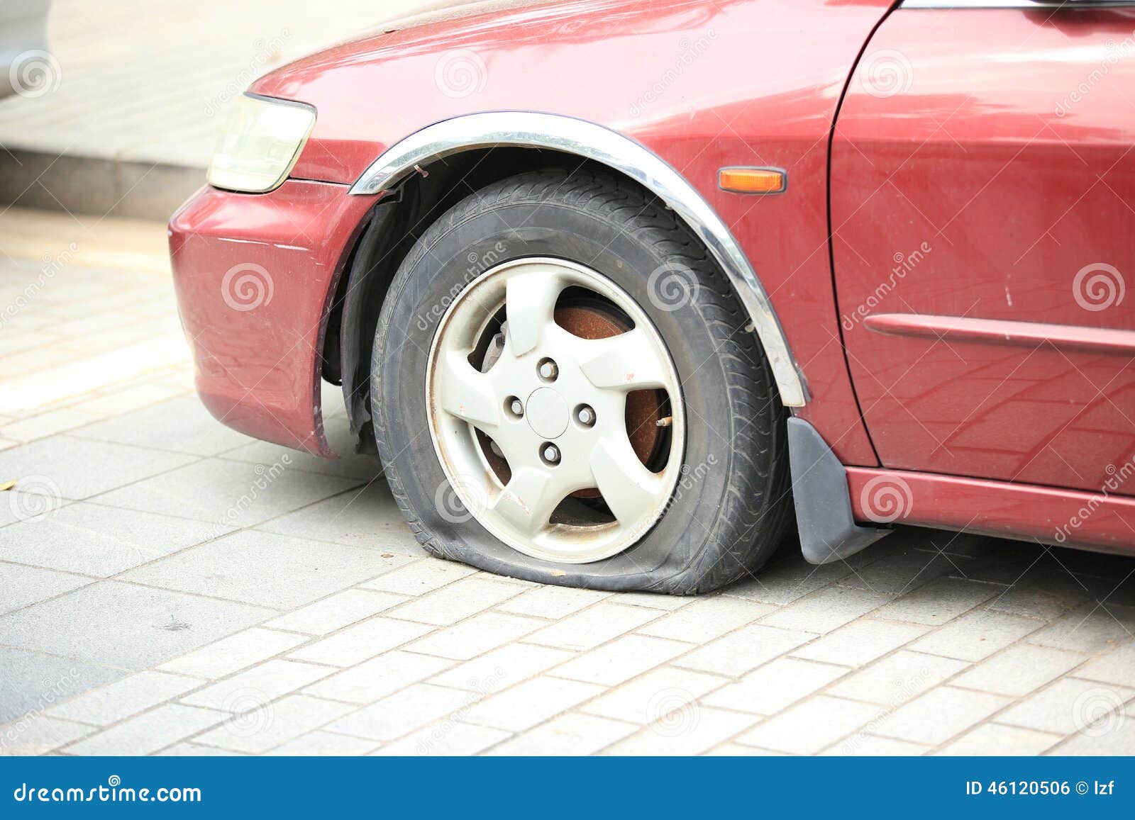 Flat tire on car wheel stock photo. Image of road, problem 46120506
