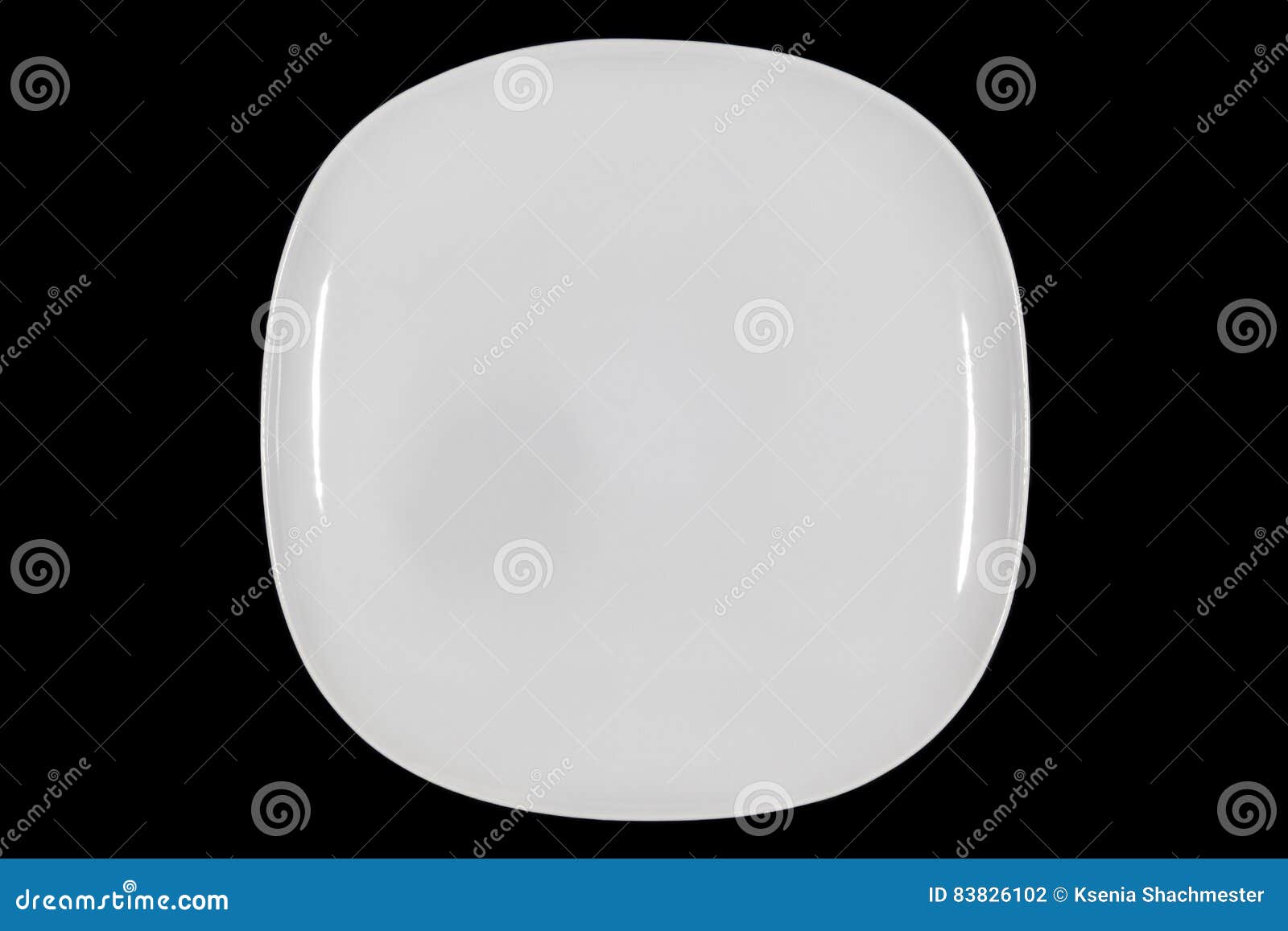 Flat White Square Plate on Black Background from Above Stock Photo