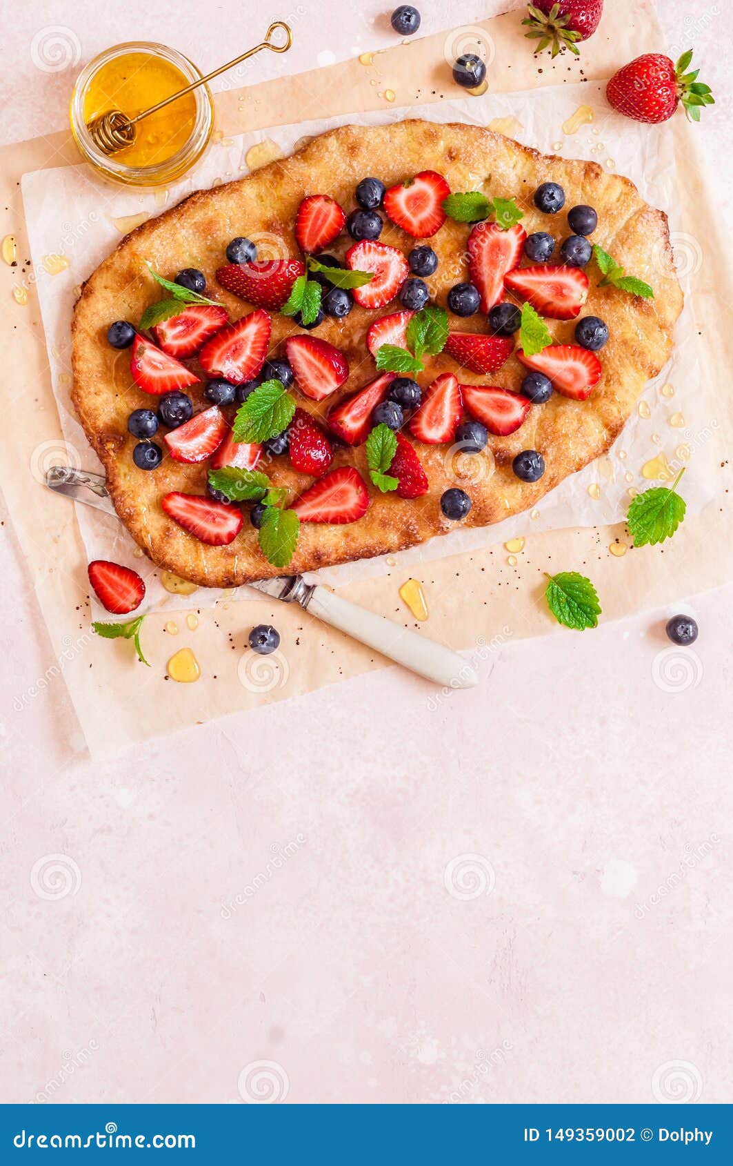 Flatbread with Berries and Honey Stock Photo - Image of form, four ...