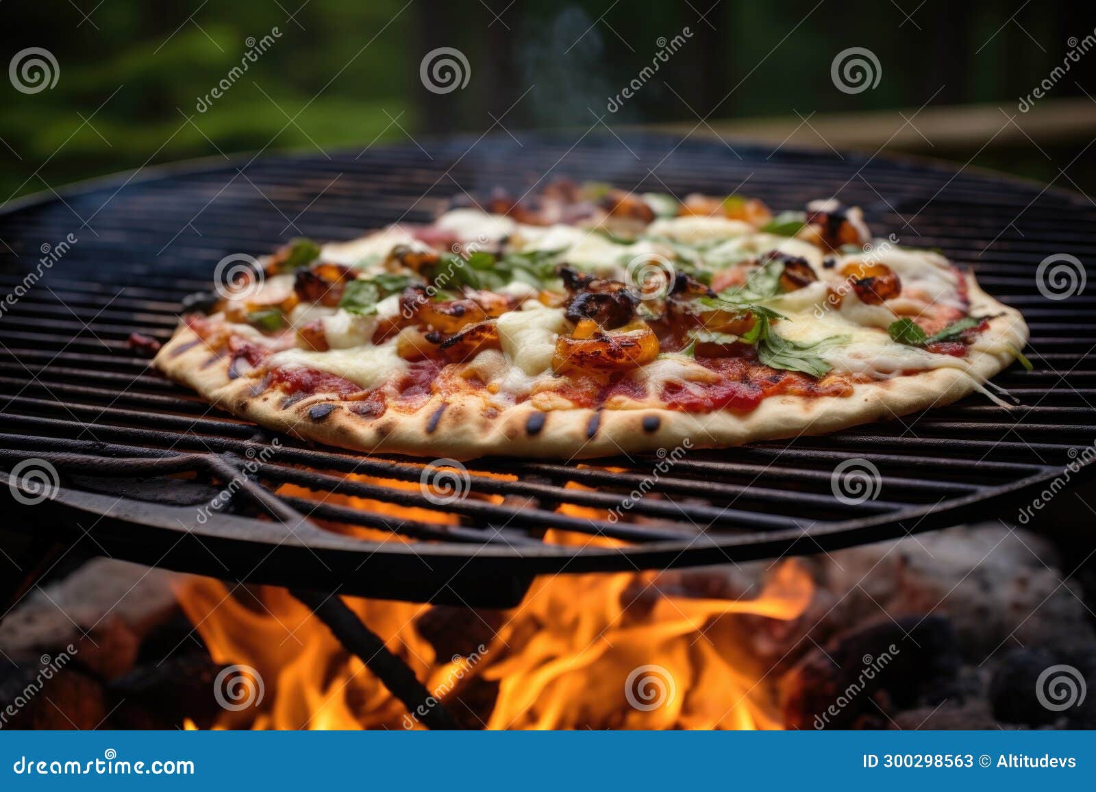 Flatbread Pizza on a Grill Outdoors, Smoke Curling Up Stock Image