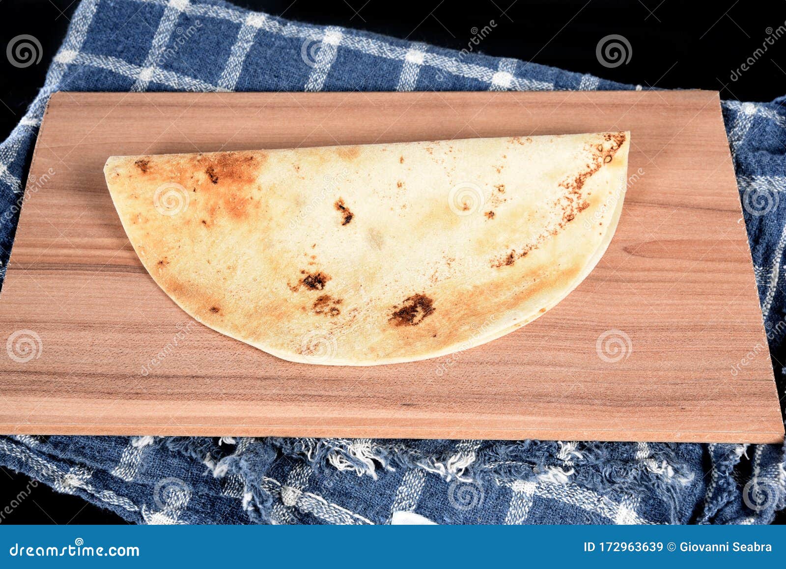 Flatbread Puff Pastry Isolated On Chopping Board Black Background Stock Image Image of africa