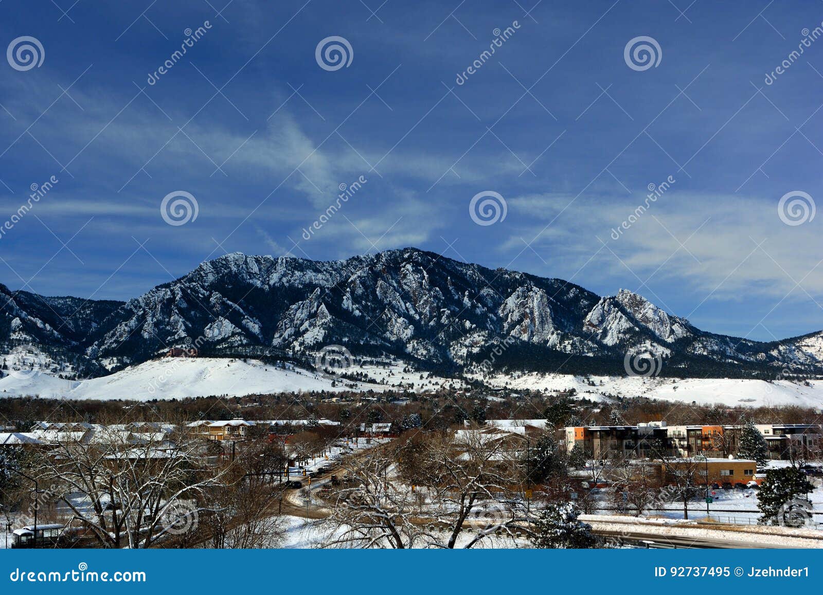 Flatirons Mountains in Boulder, Colorado on a Cold Snowy Winter Stock