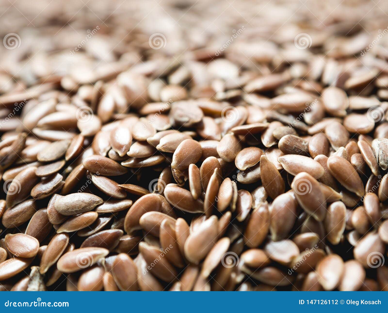 Flax seeds on linen cloth stock photo. Image of flax 147126112
