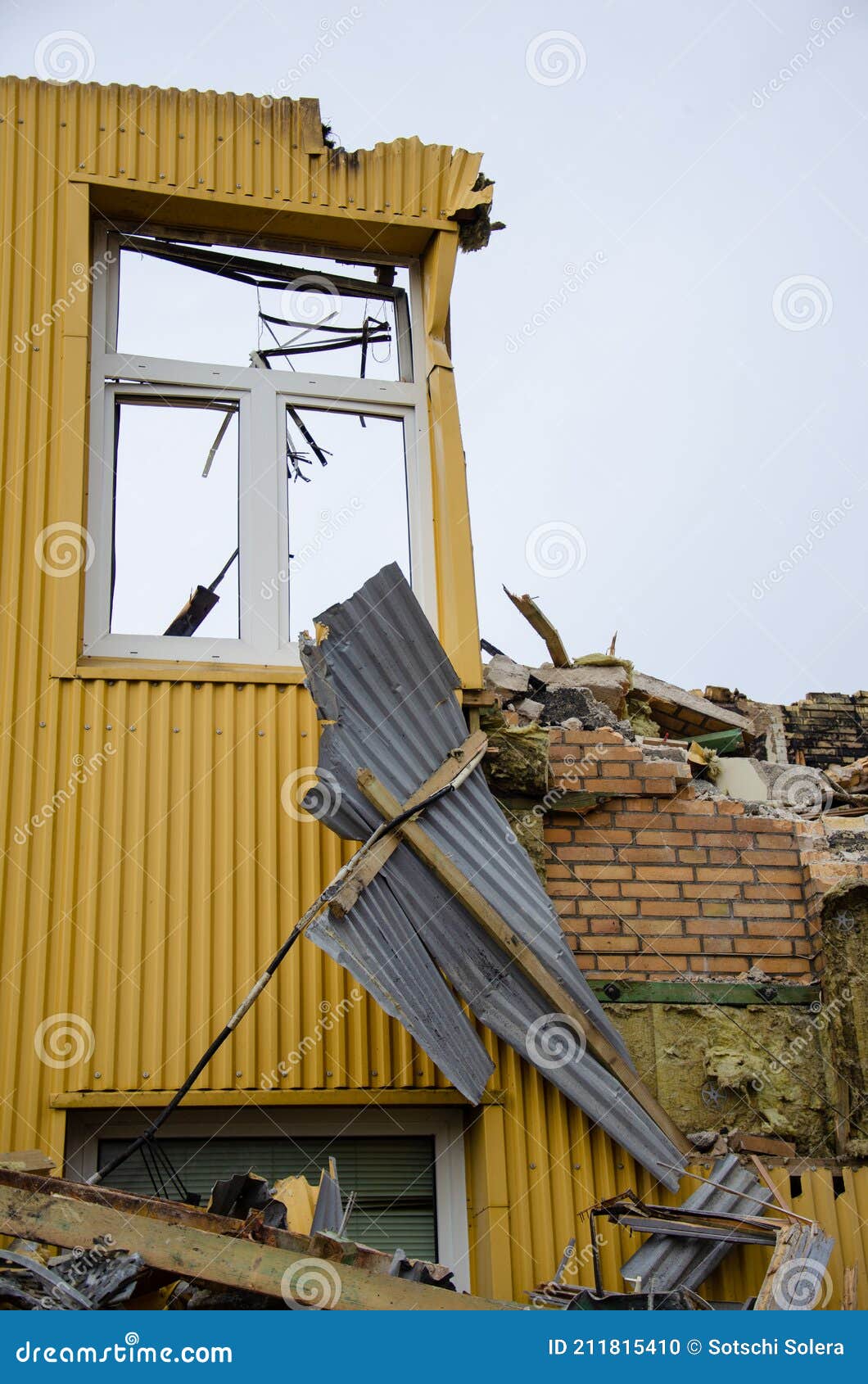 flensburg fahrensodde burning fire airplane hanger. yellow destroyed facade with broken window