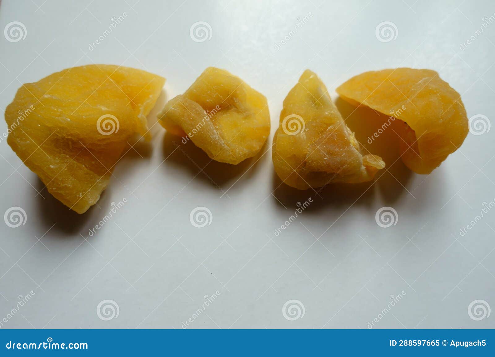 4 Fleshy Yellow Dried Passionfruit Slices in a Row Stock Image Image