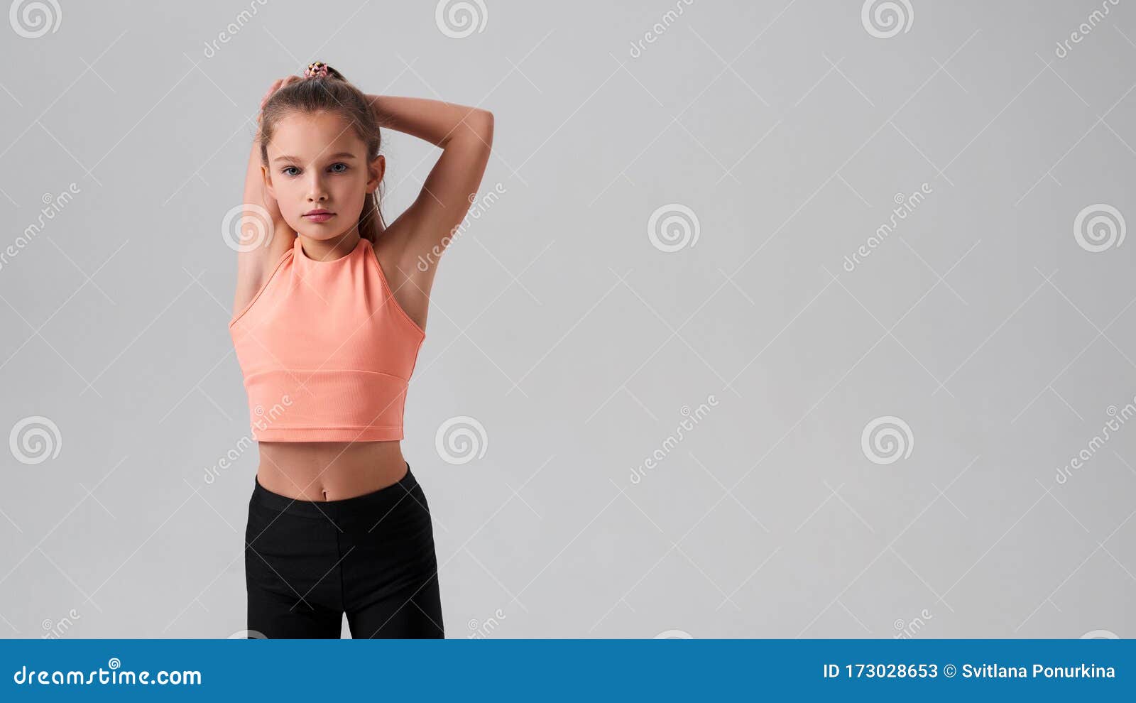 A good stretching regime. Cute gymnast practicing yoga or pilates. Little  girl doing split outdoor. Small child girl stretching legs muscle. Fit  child Stock Photo - Alamy